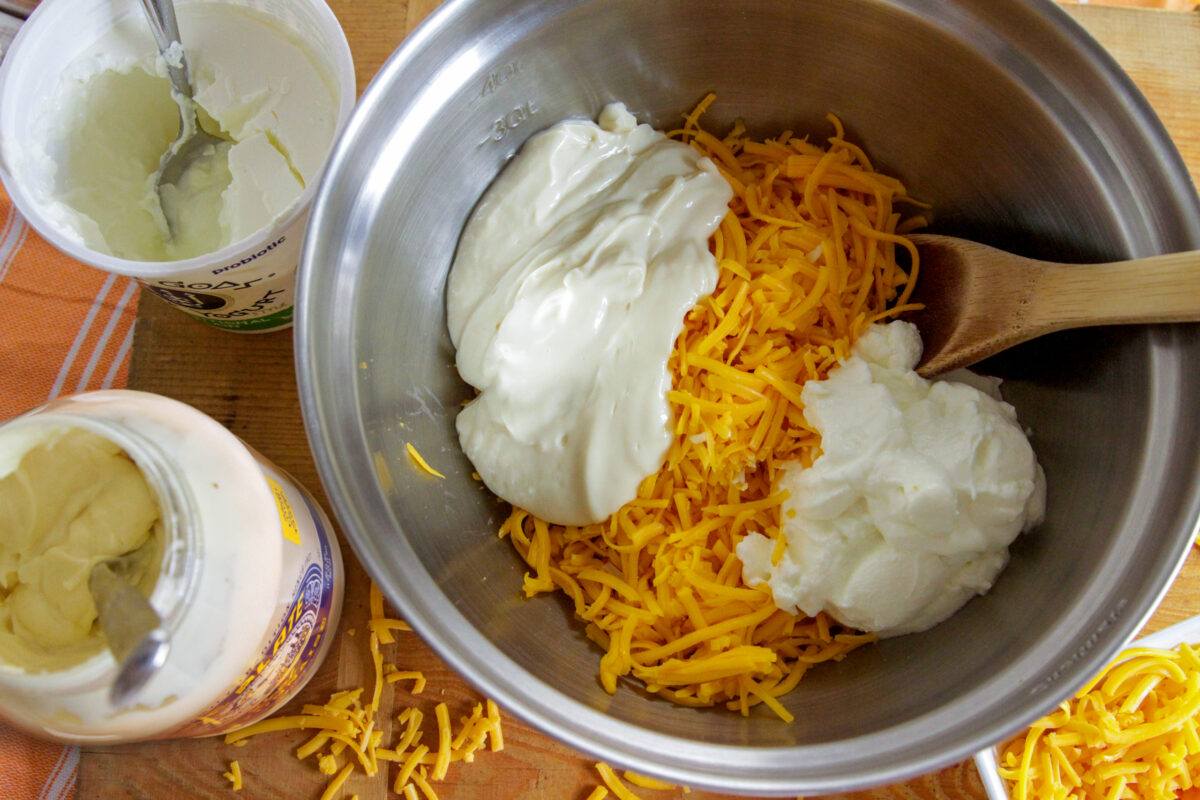 mixing cheese and blue plate mayo in a bowl