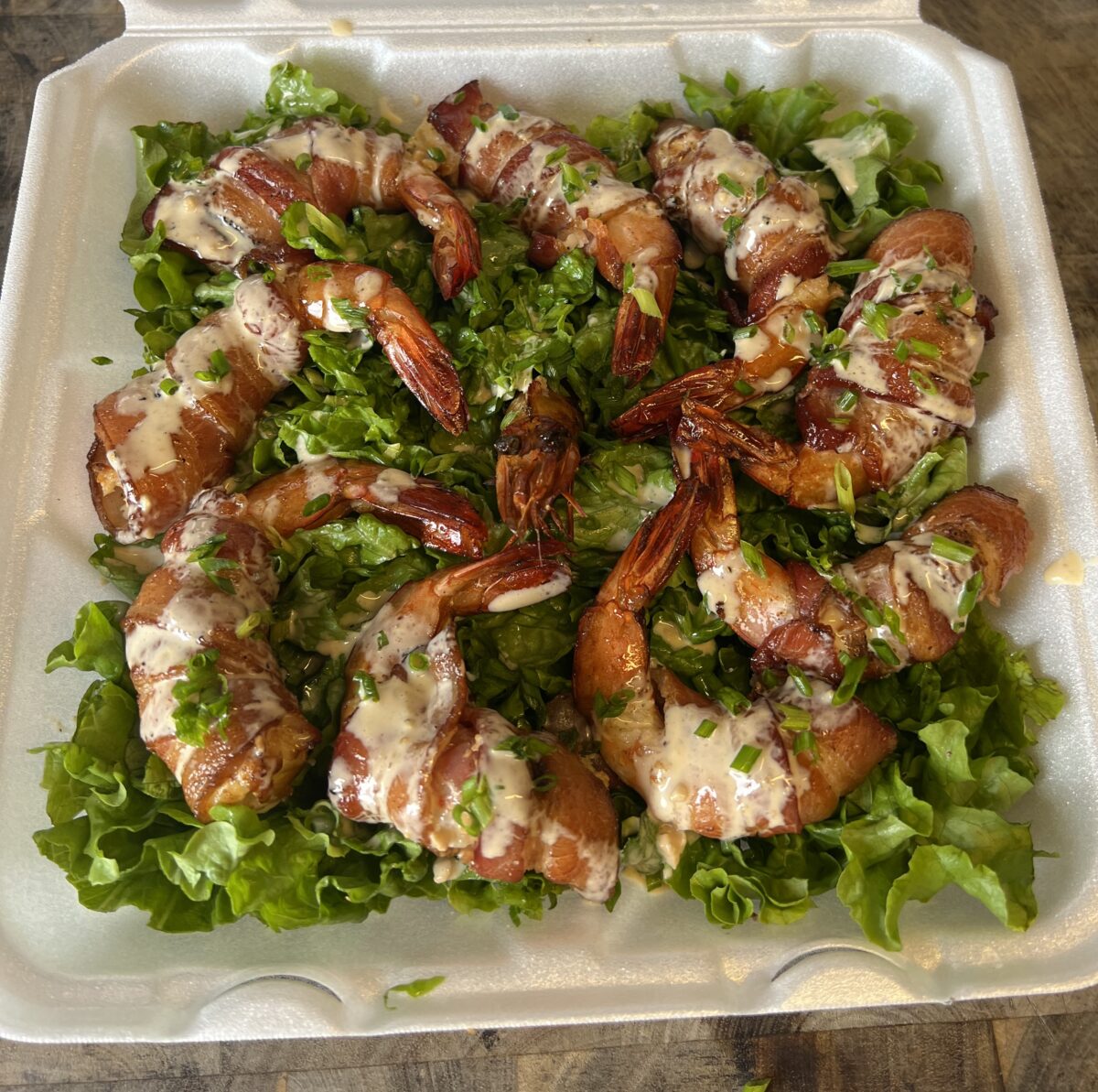 Captain’s Smoked Bacon-Wrapped Shrimp with Louisiana White SauceHogs for the Cause 2025 winning recipe. Recipe courtesy of Hogs For The Cause “Team Stabbin”